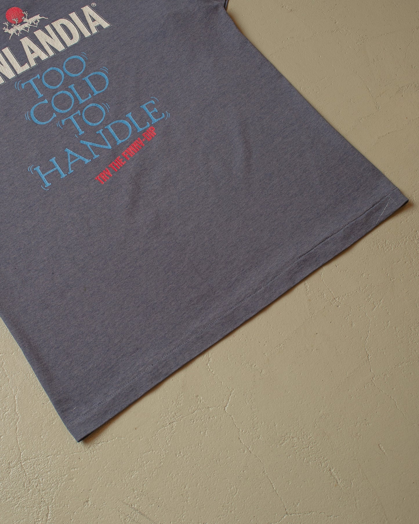 1990s distressed "Too cold to handle" Finlandia T-shirt blue - XL