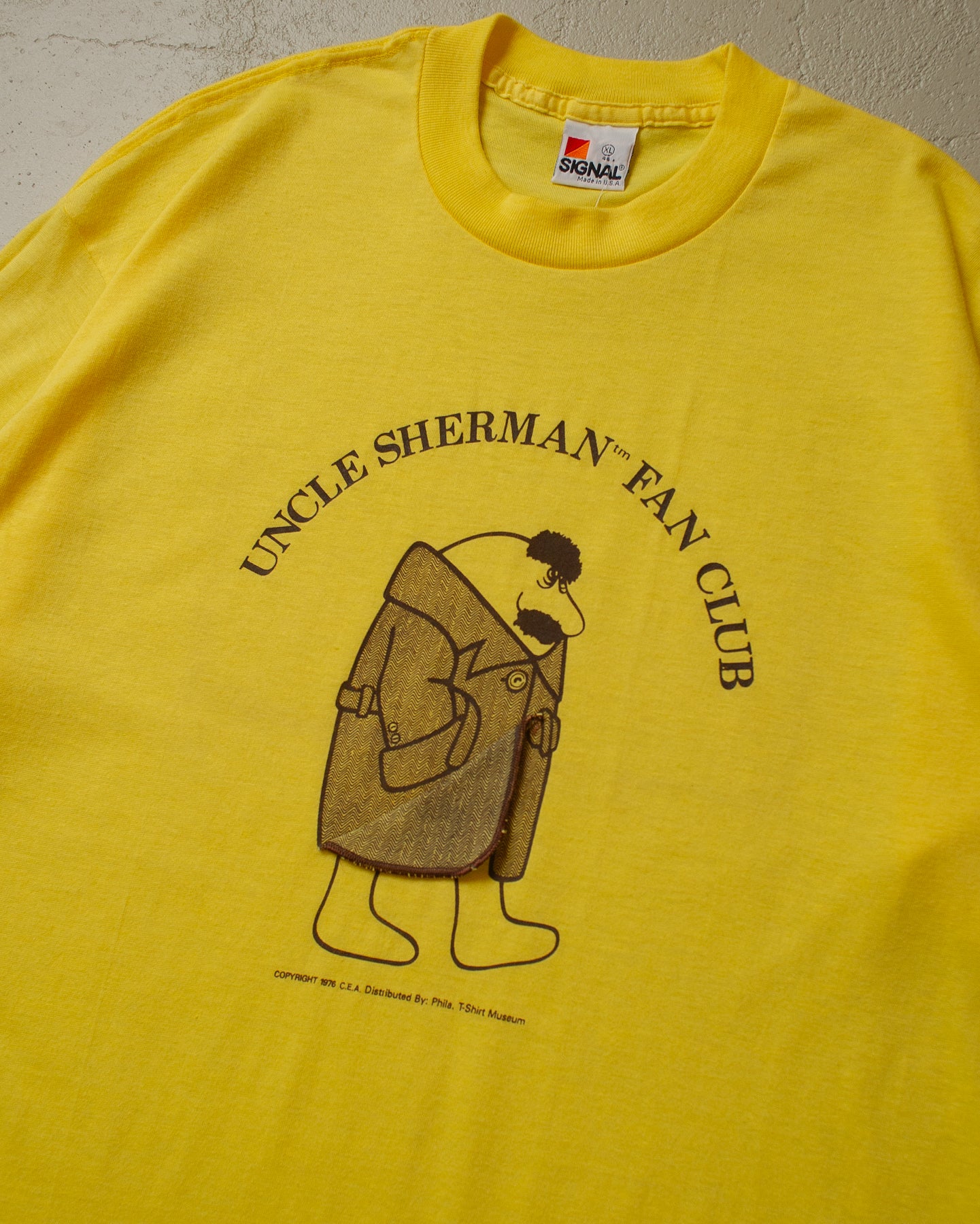 1976 unworn Uncle Sherman Fan Club T-shirt yellow - L/XL