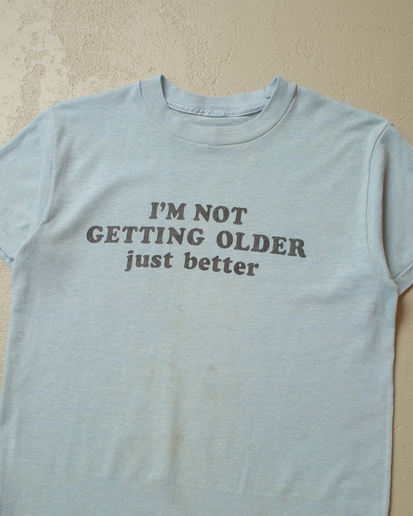 1980s distressed "getting better" T-shirt blue - XS/S