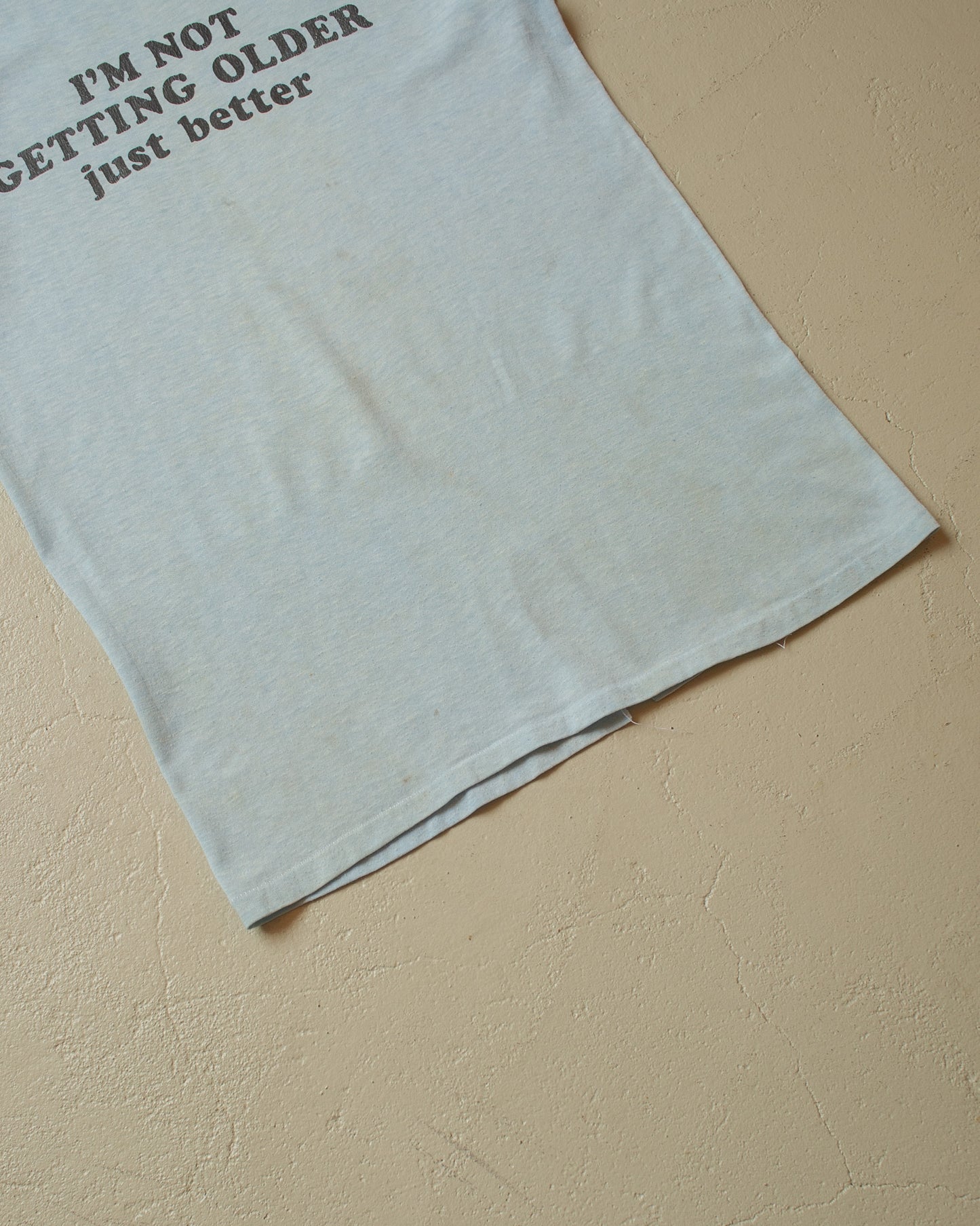 1980s distressed "getting better" T-shirt blue - XS/S