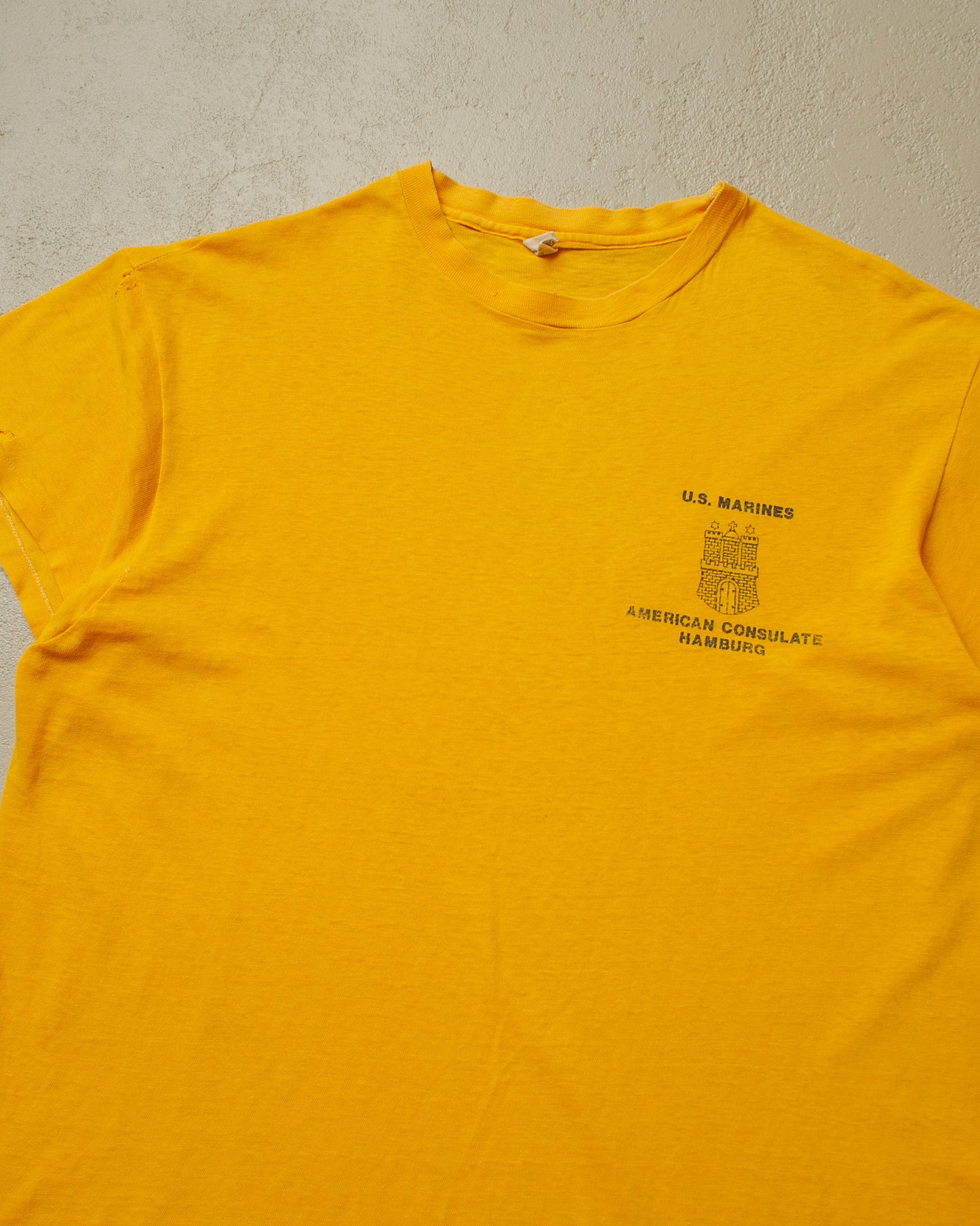 1970s/80s distressed US Marines Consulate Hamburg T-shirt yellow - XL