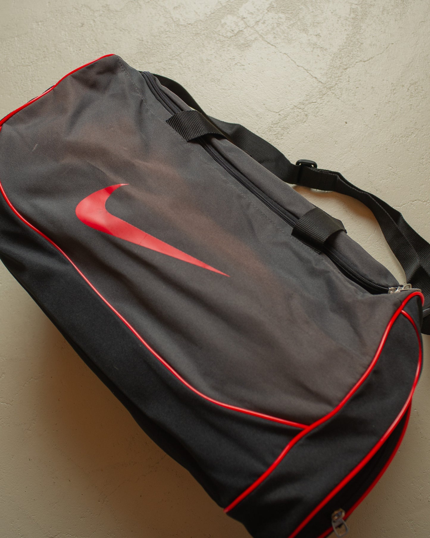 2000s Faded Nike Swoosh Duffle Bag black