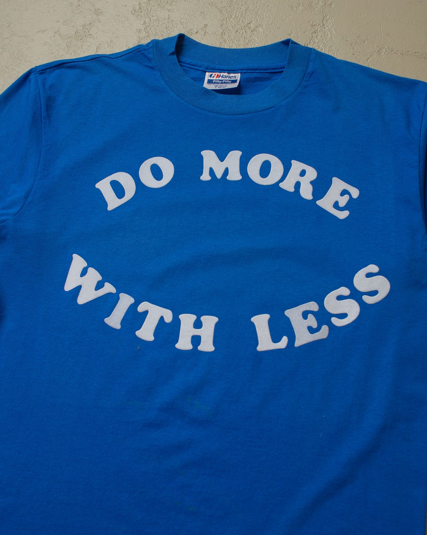 1980s unworn "Do more with less" T-shirt blue - M/L